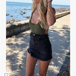 Black denim mini skirt. Brand new with tags